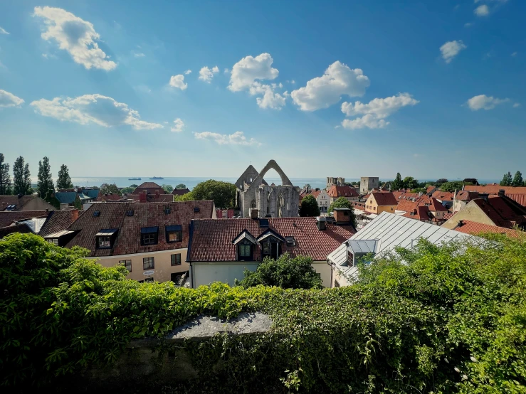 some buildings and trees on a sunny day