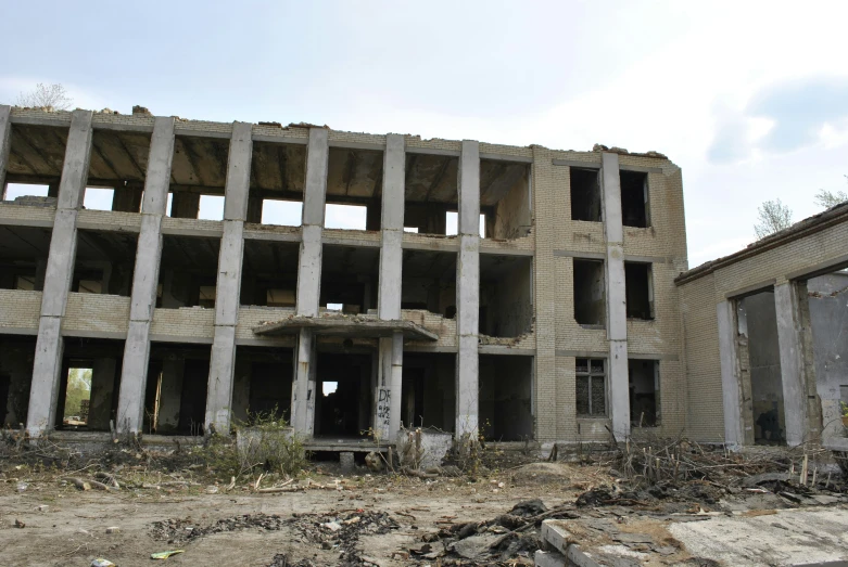 a building in disrepair, with the walls  off