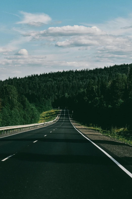 two long straight road on an open country side