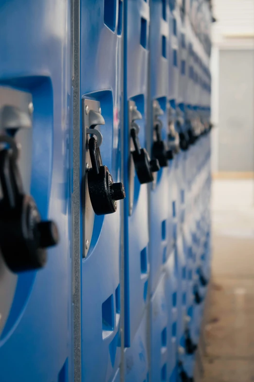 the doors of a row of lockers are full of key pieces