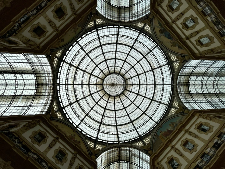 an overhead view of the glass ceiling of a building