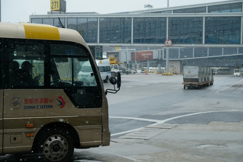 a bus parked on the street near a terminal