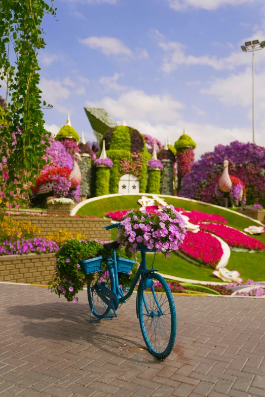 a bicycle decorated with flowers on the street