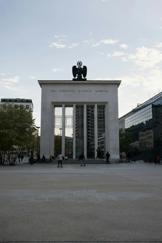 a big building with a number of people standing around it