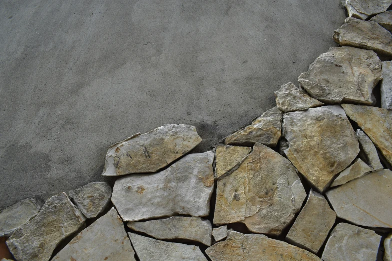 a close up of a street with many stones