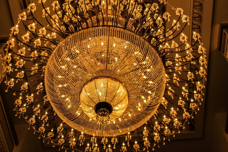 a fancy chandelier with multiple lights on it