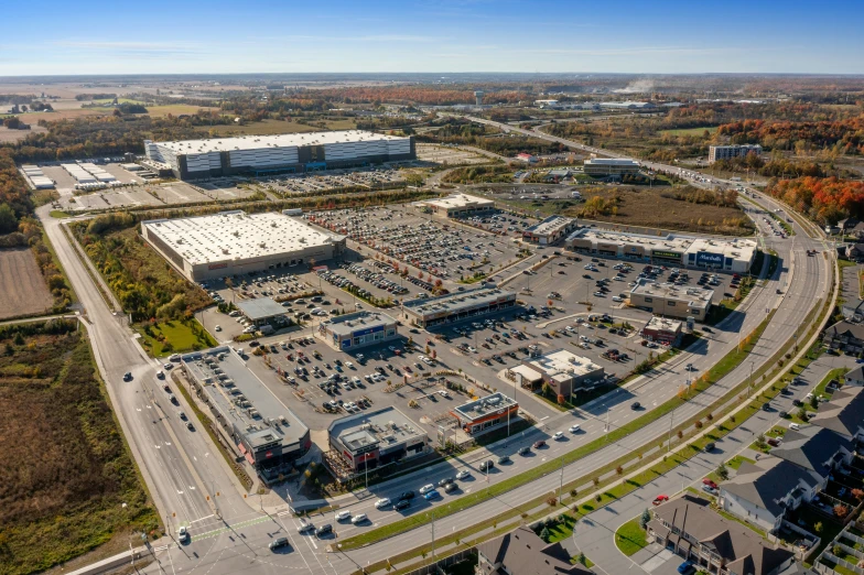 an aerial po of an automobile parking lot