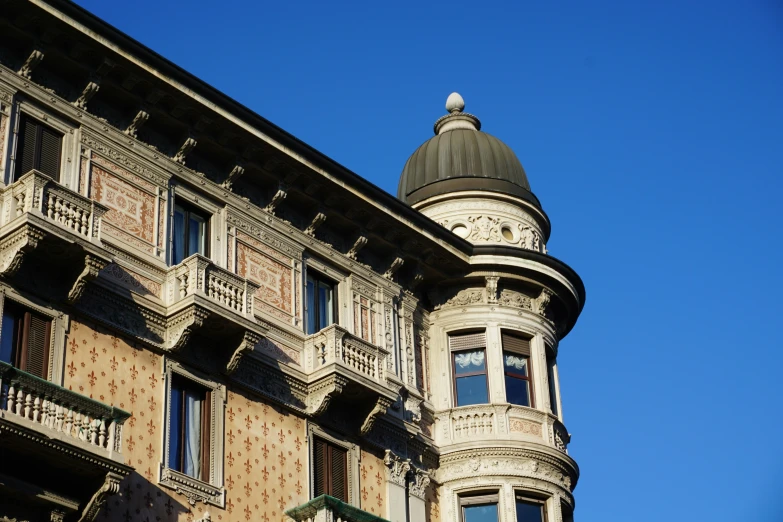 the clock on this building is in its right hand corner