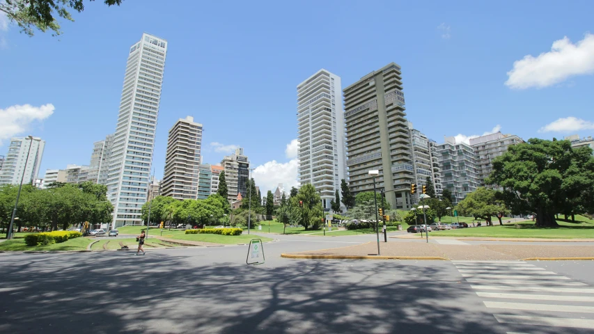 large city buildings with a street in the foreground