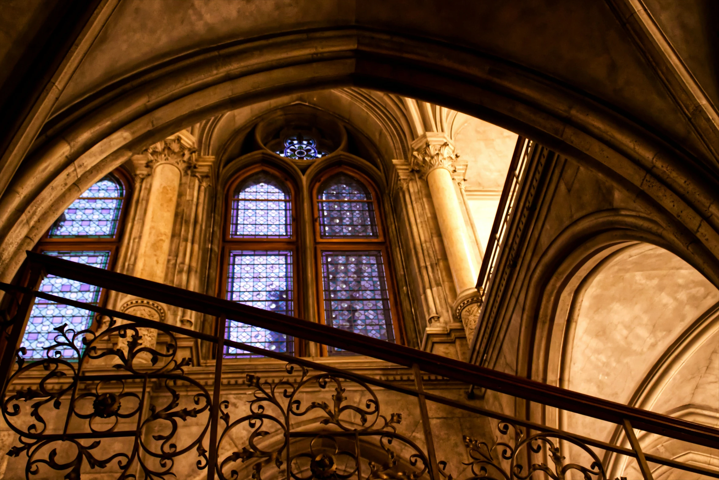 a stairway up to an old gothic building