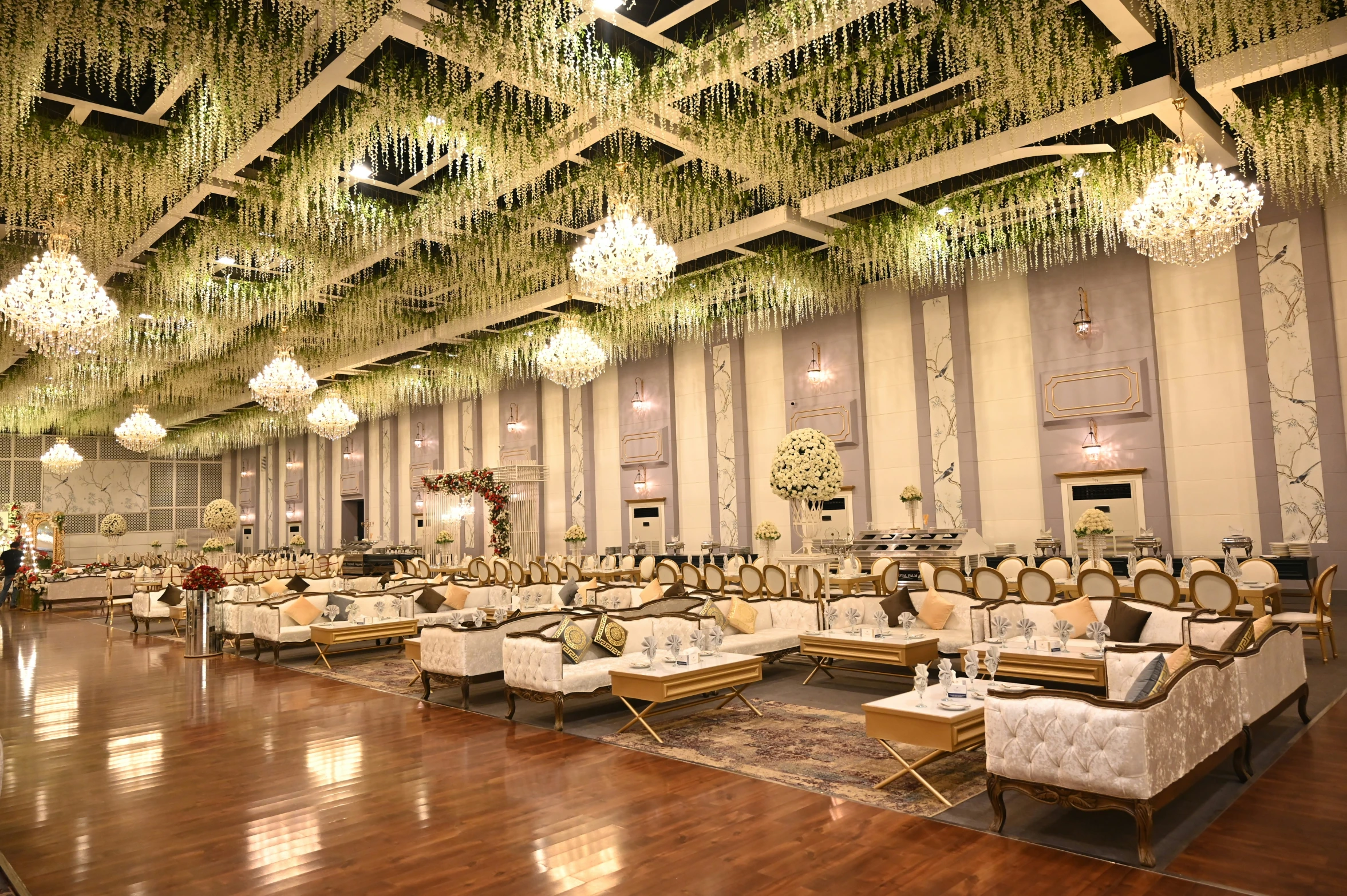 the lounge is decorated with plants and chairs