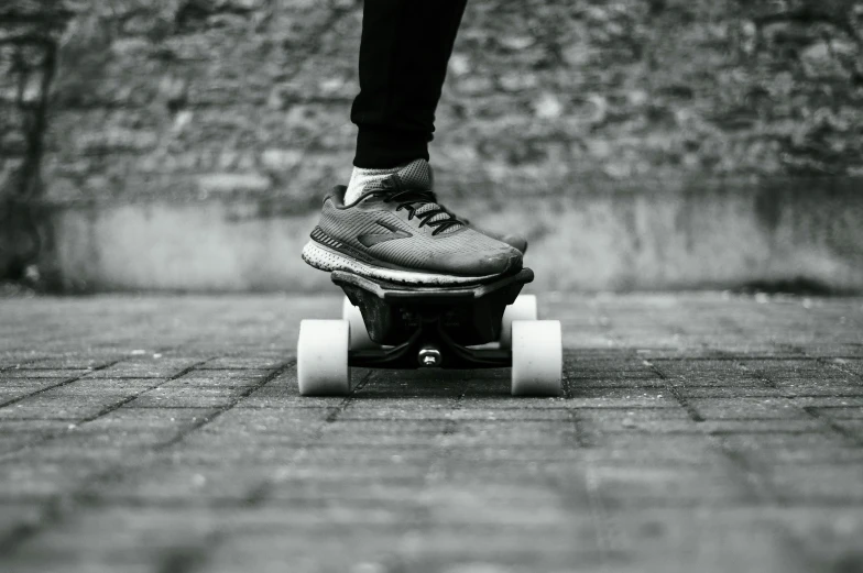 there is a male skateboarder wearing all black