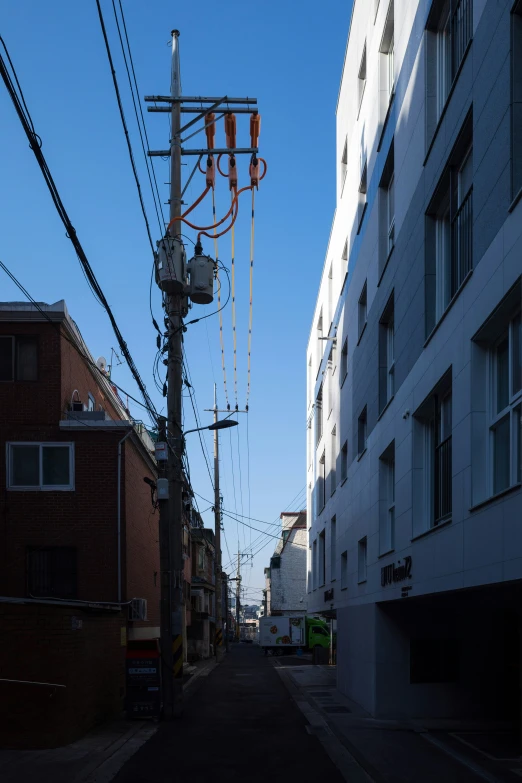 the telephone wires are very tall and have been bent