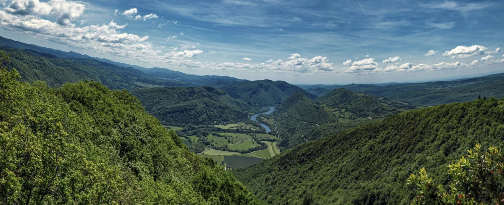 a panoramic view from the top of a hill