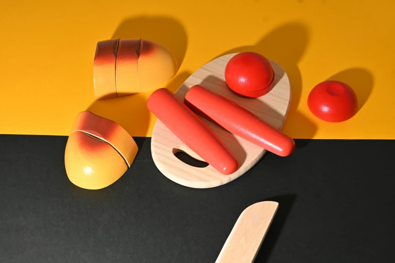 a table topped with a small wooden object