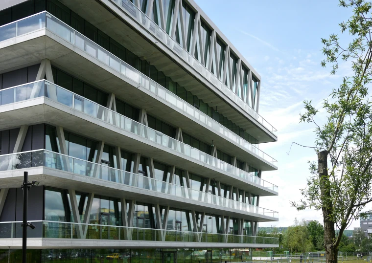 a tall building with windows and balconies