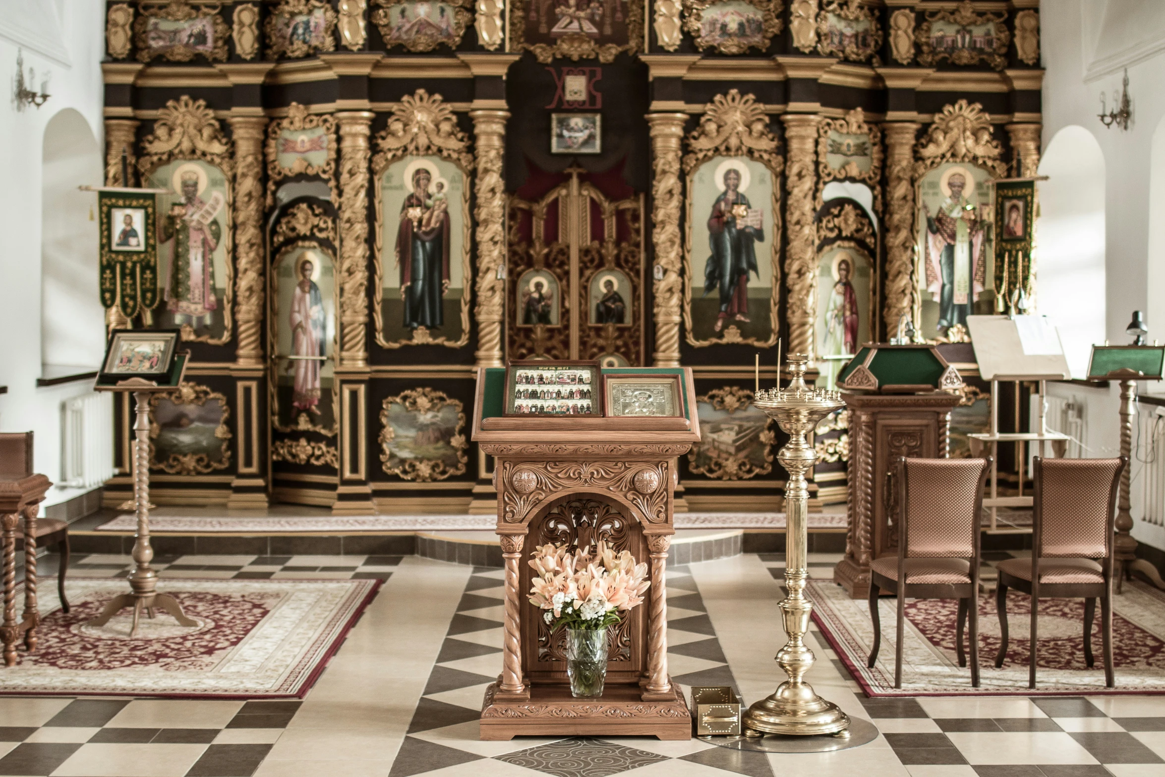 a altar and alter are decorated with ornate paintings