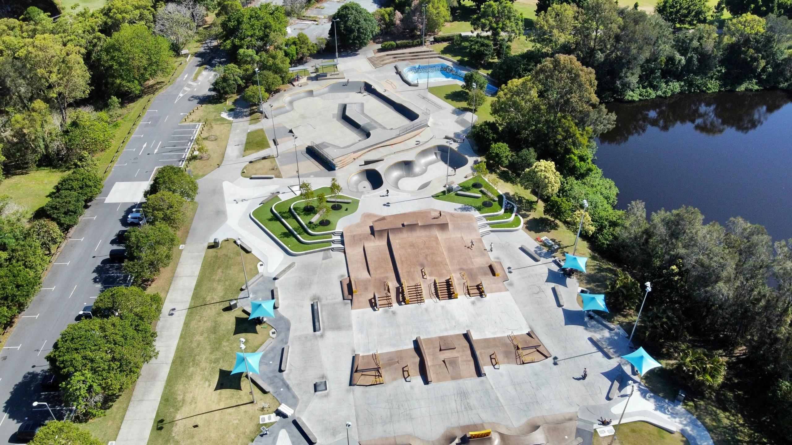 this is an aerial s of a skate park and pond