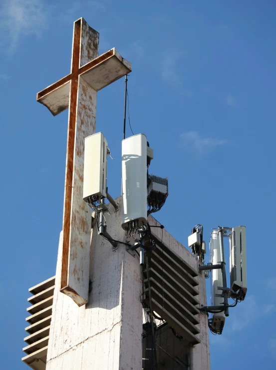 two white towers against the blue sky on an old building