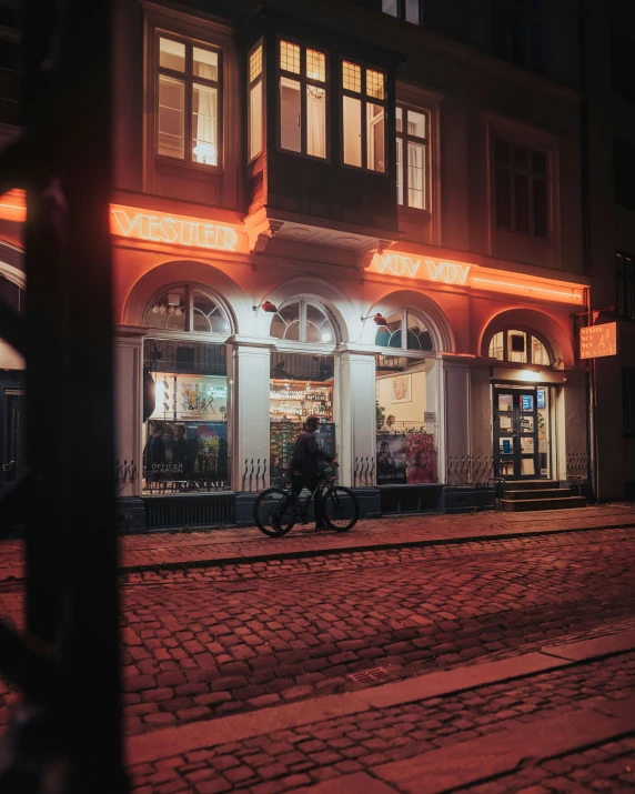 a night time scene with the lights off on a storefront