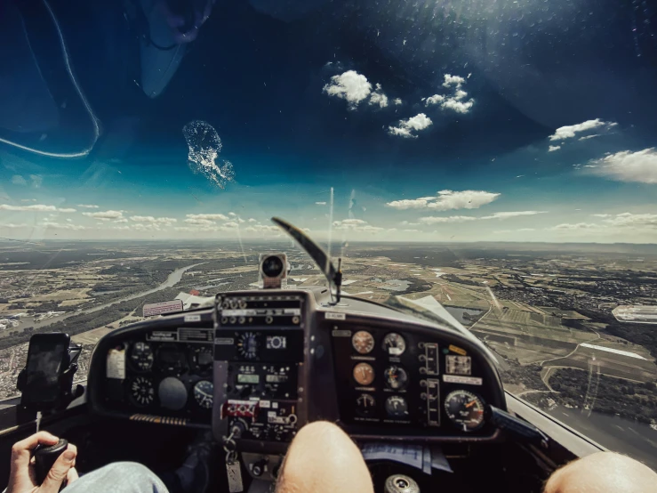 two people are sitting inside of a plane