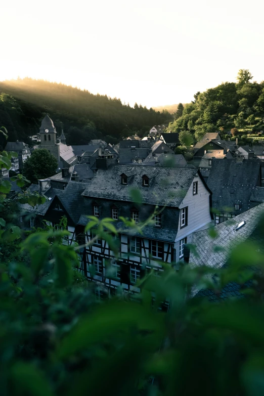 the village is surrounded by wooded mountains