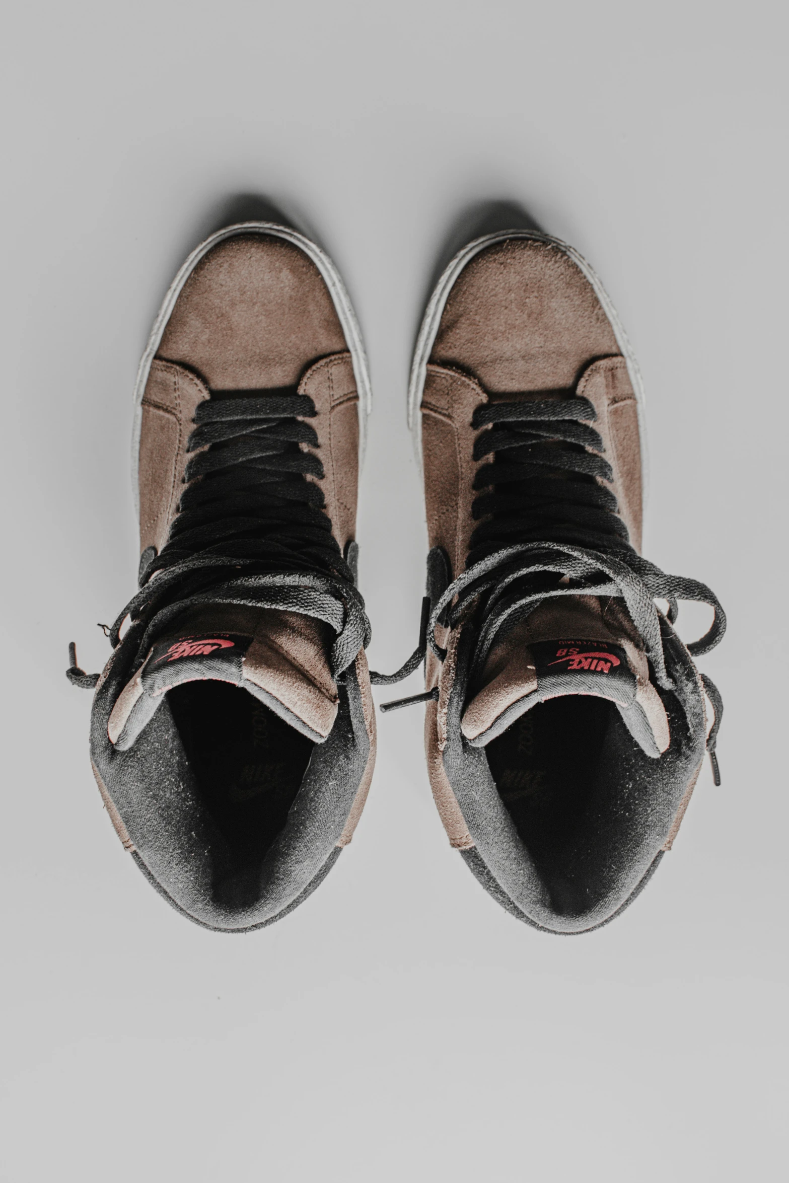 the shoe is attached to a gray and black pair