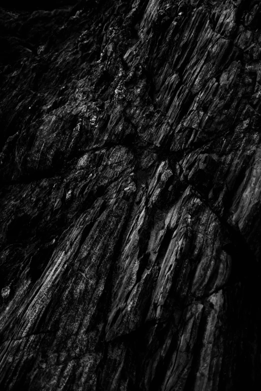 black and white pograph of a large rock formation