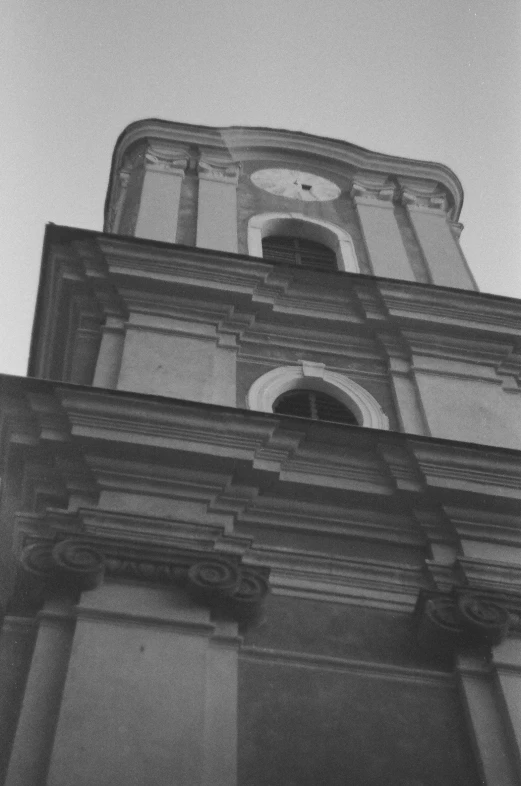 a very tall building with a big clock