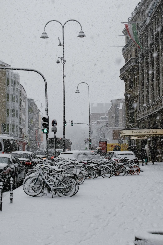 a bunch of bikes that are sitting in the snow