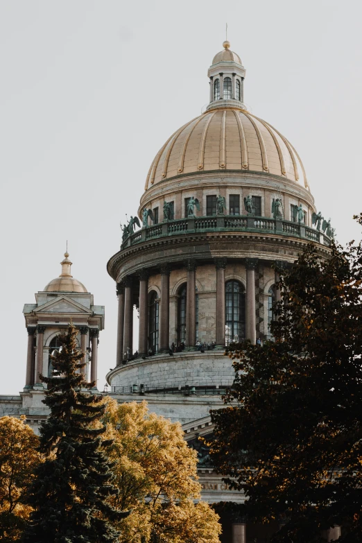 a building in the center of a city with a domed roof