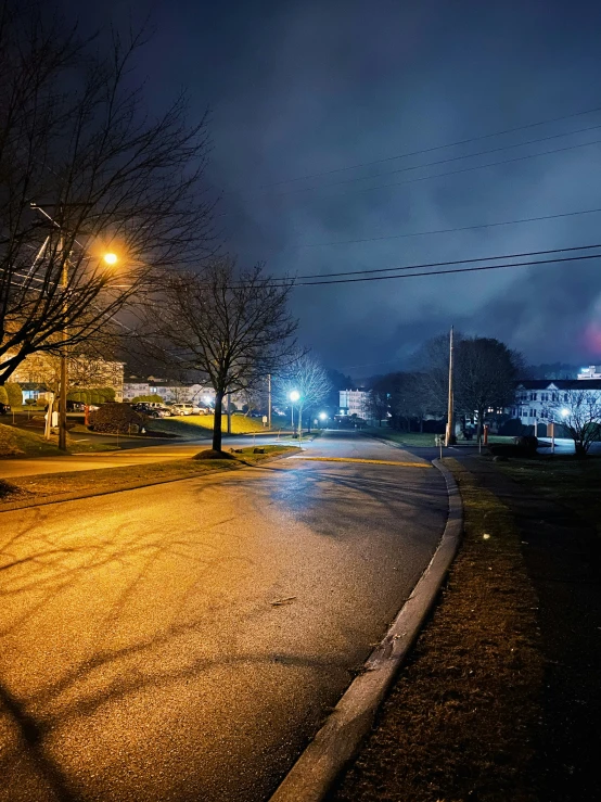 this po captures a nighttime city street in the suburbs