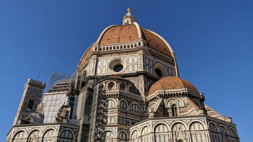 an old cathedral is shown on a clear day