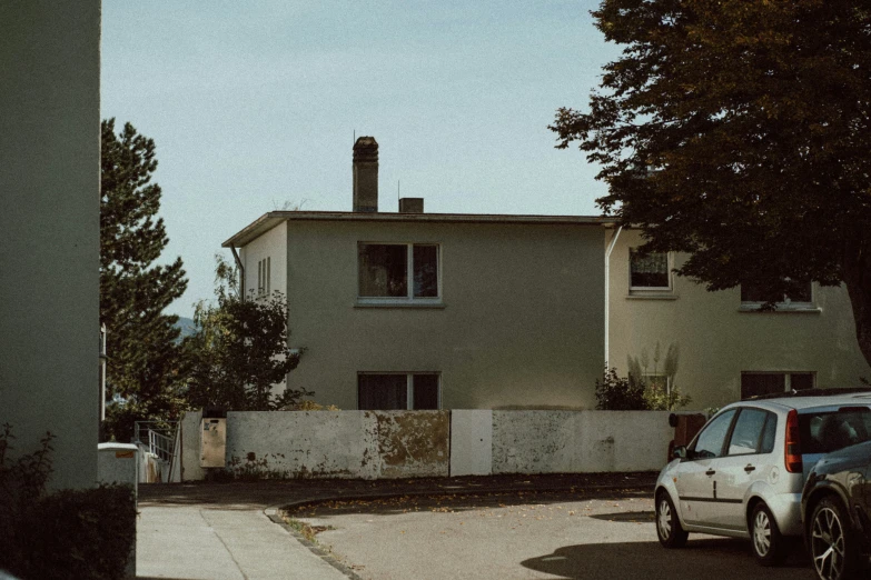 a street view with a car parked on the side