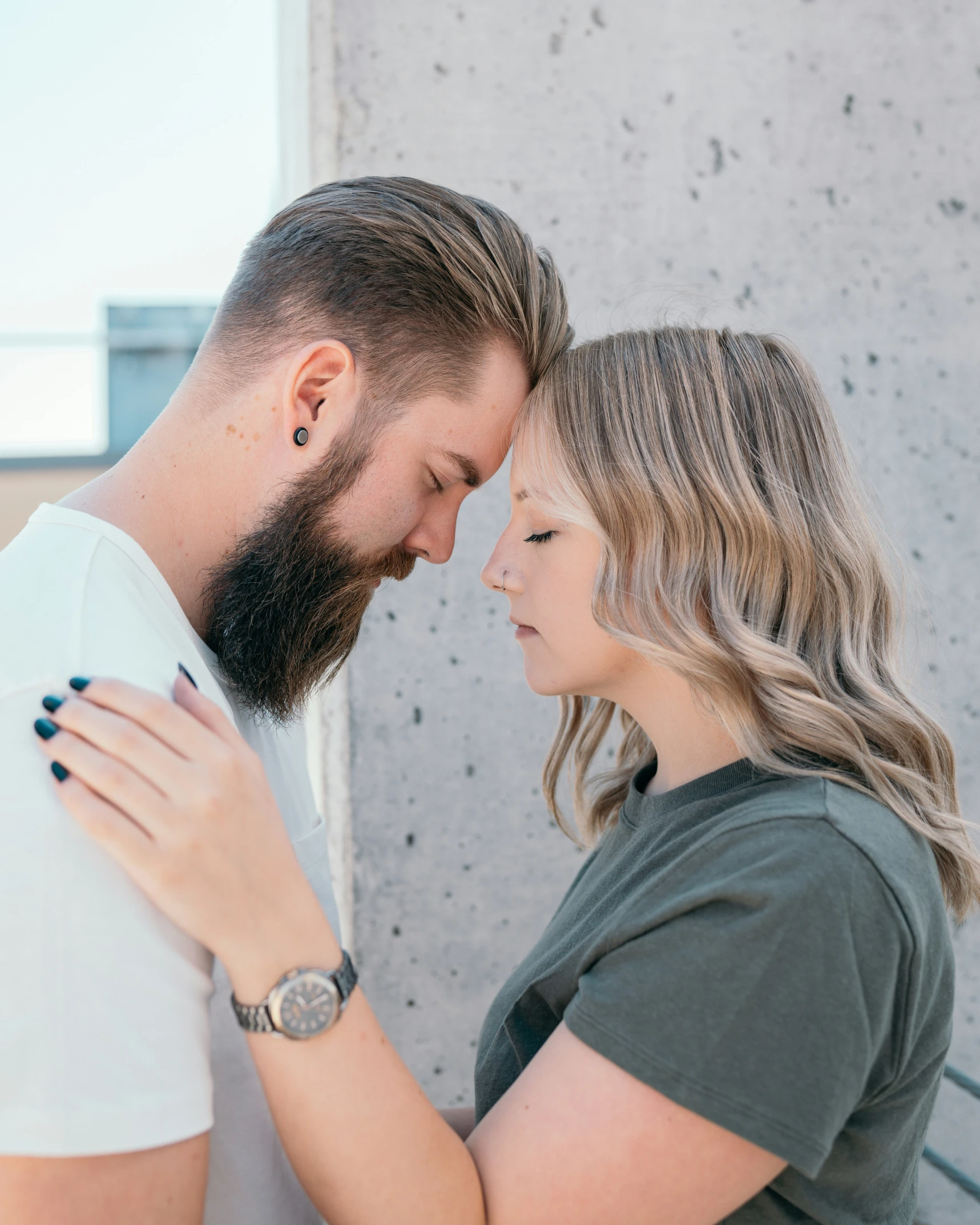 the couple has their hands on each other