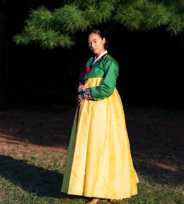 a woman in a bright yellow and green costume