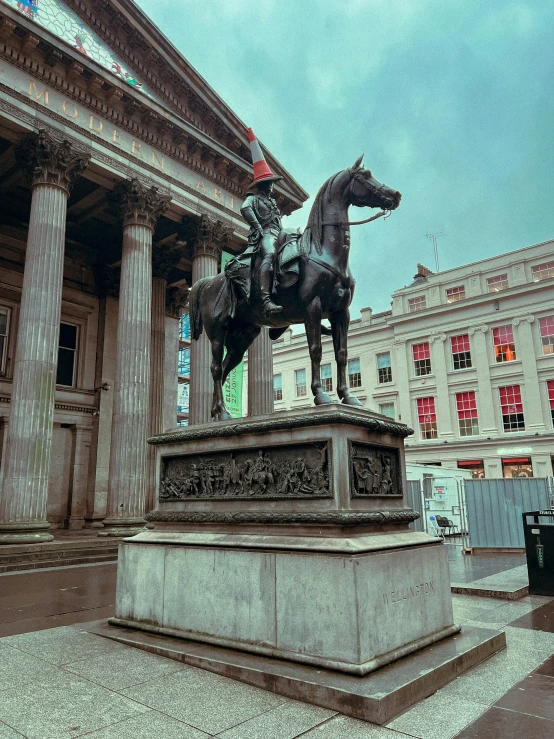 the statue of a man on top of a horse outside