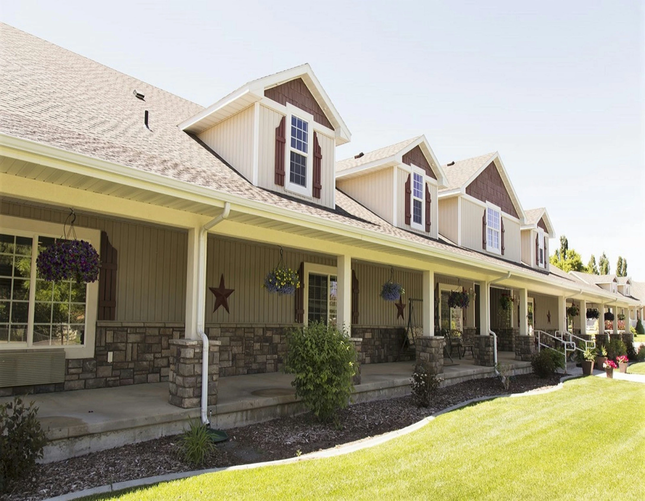 front view of a house with large porch and columns