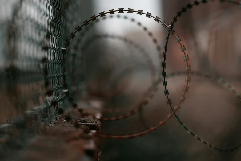 several rusty looking razor wire on the outside