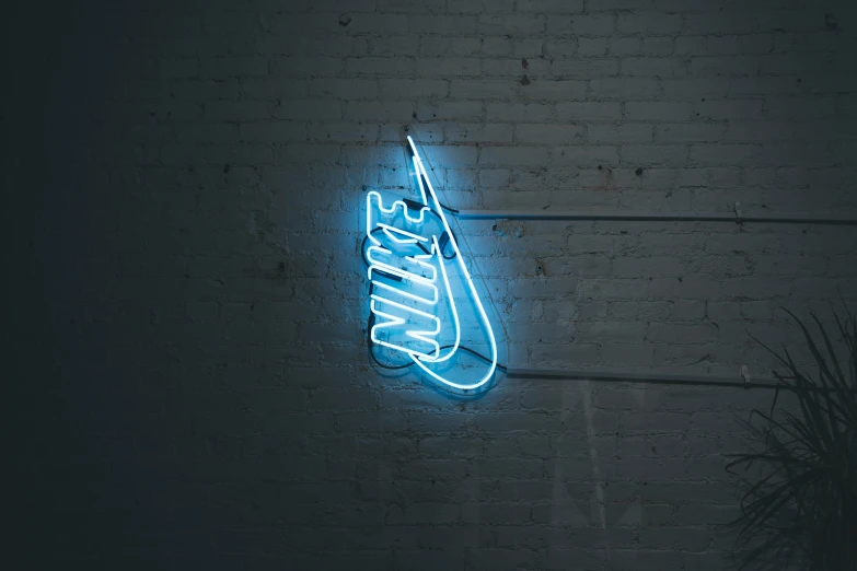 a neon sign is shown on the wall