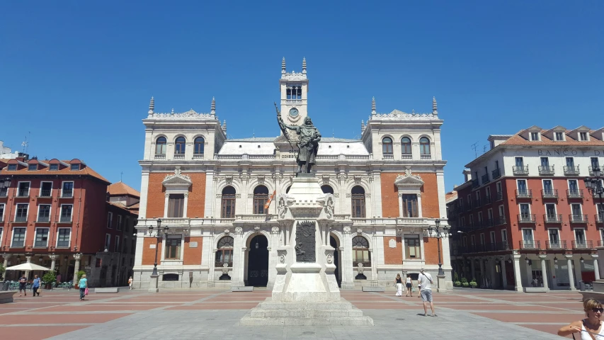 the square of a building has a clock tower