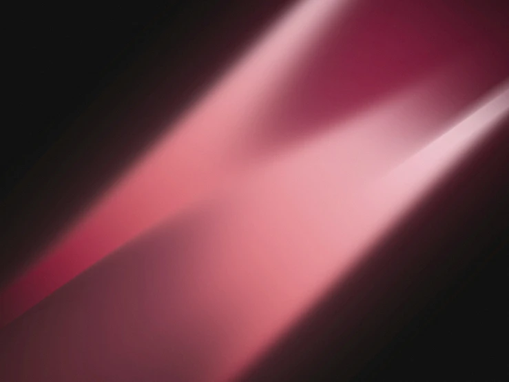 a blurry image of red and white light