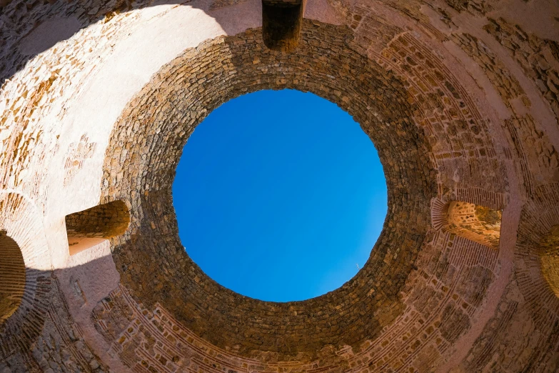 looking up at the top of the brick structure