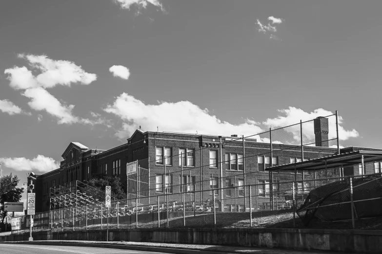 an old building that has a fence around it