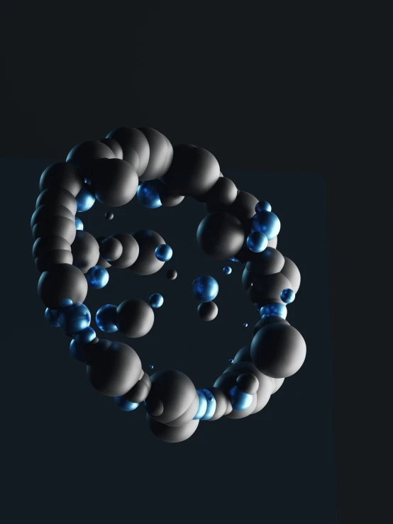 blue, white and grey spheres are arranged in a spiral