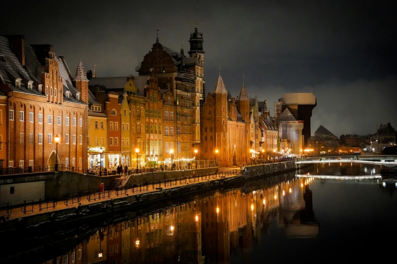 a river in the city center at night