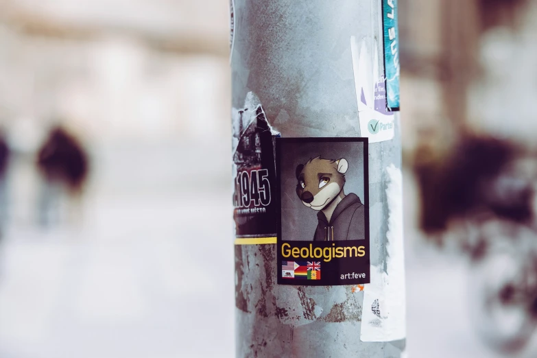 the sticker is attached to the pole with the name of the city