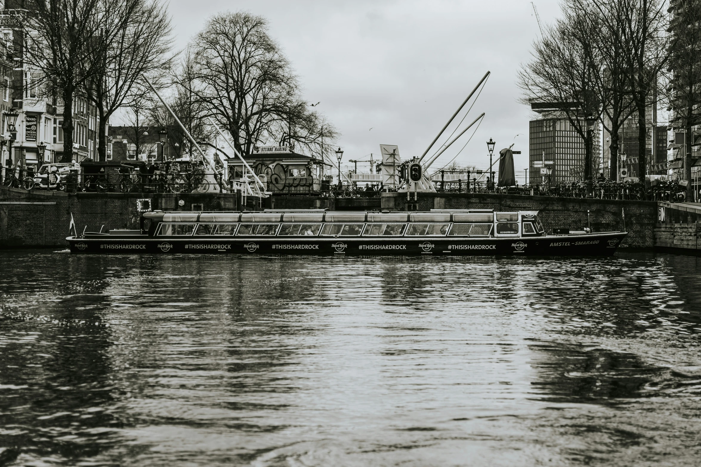 black and white image of a boat dock