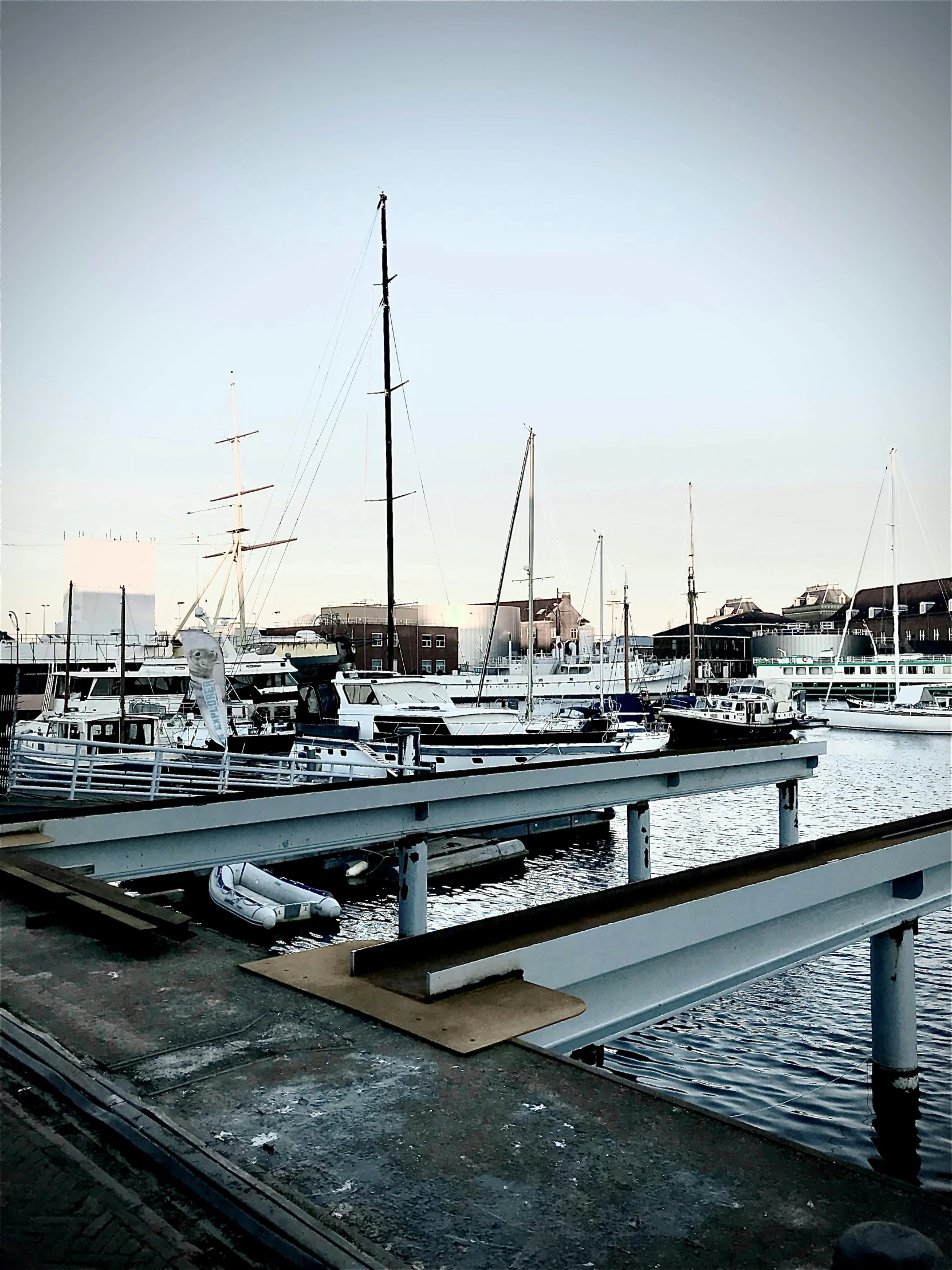 this is a dock with boats in the water