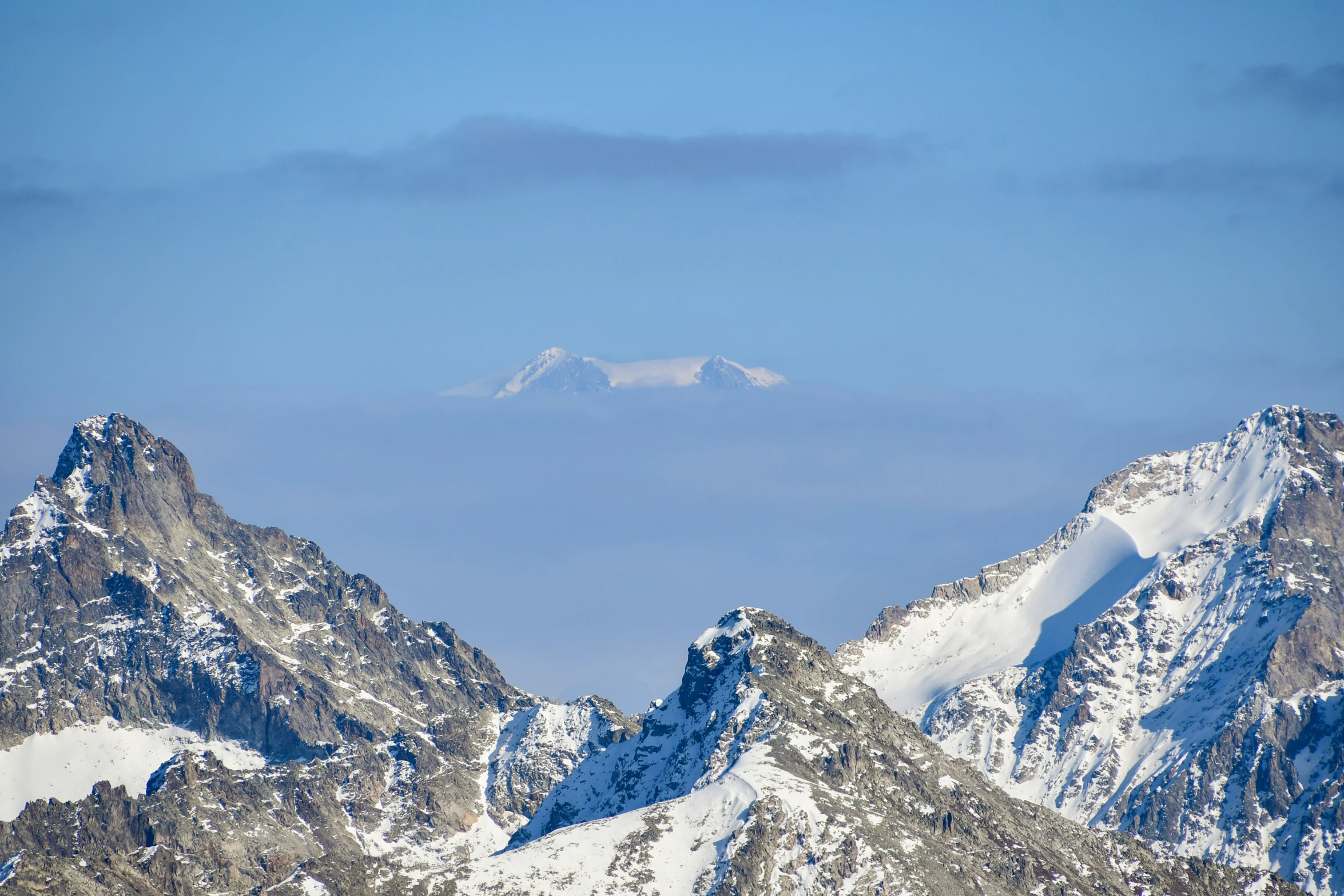 some mountain ranges that are snow covered